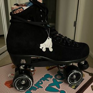 Black suede Moxi skates size 9